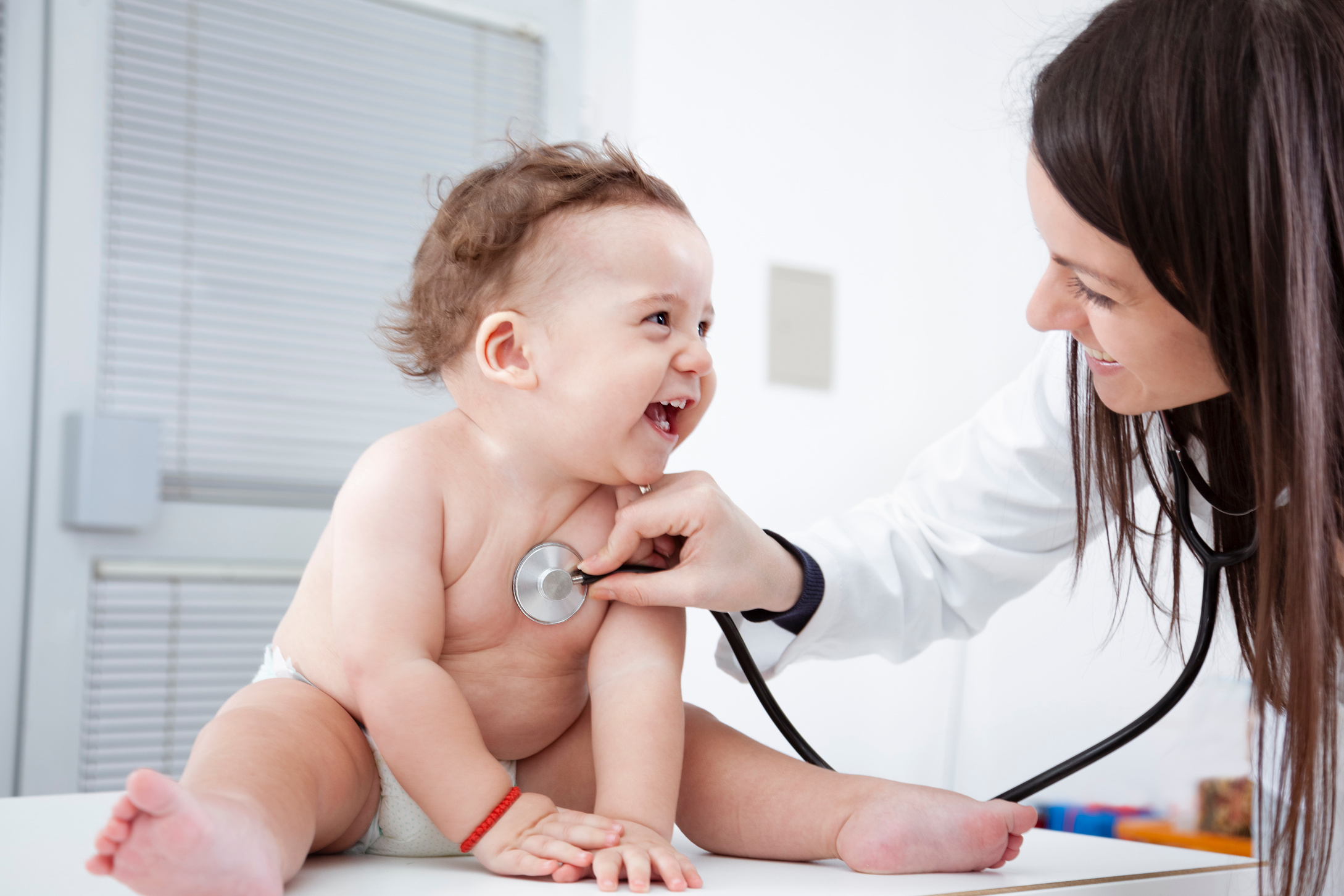 Doctor Examining Baby